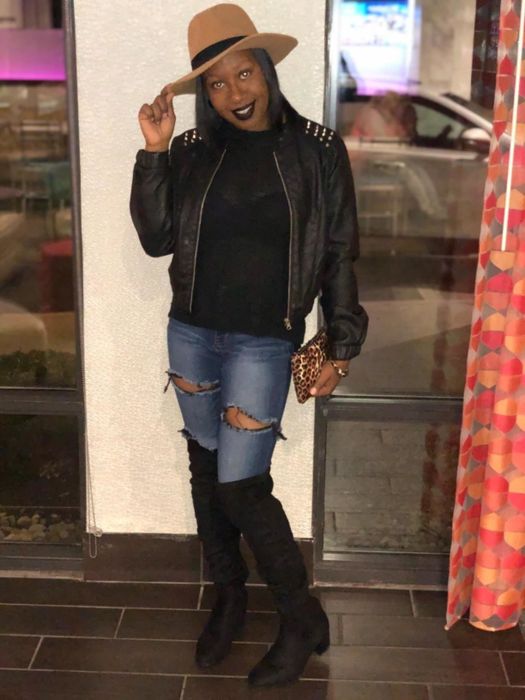 Another reviewer is shown wearing the boots with a pair of jeans.