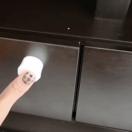 A reviewer's video demonstrating how to open a drawer using the provided magnetic key, showing how easy and secure it is.