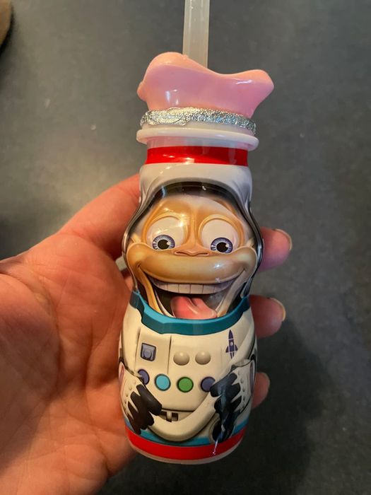 An image of a yogurt bottle with the cap placed on top, as part of a review photo.