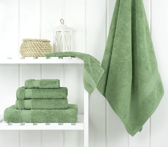 six towels in a green hue