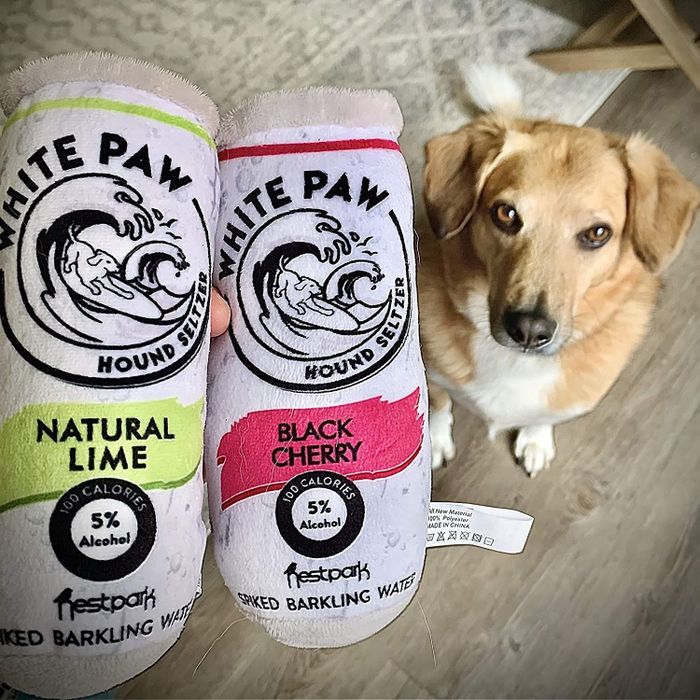 Two plush toys designed to resemble the Natural Lime and Cherry flavors of White Claws.