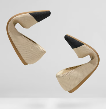 Beige flats folded in half, showcasing their ultra-flexible sole.