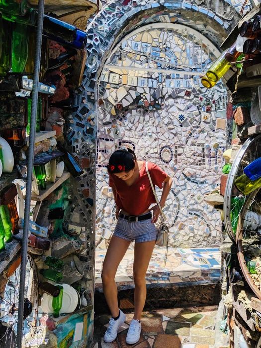 Reviewer wearing the white sneakers