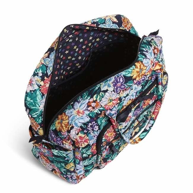 A small zippered duffel bag in a vibrant floral pattern.