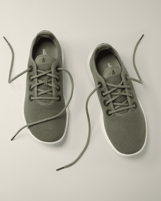 A pair of casual lace-up shoes made with breathable fabric and flexible soles, ideal for everyday wear