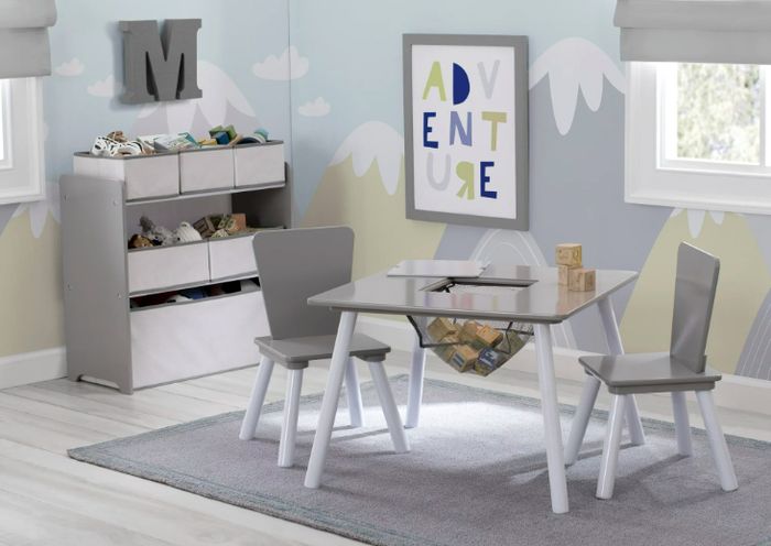 The playroom set arranged in a room, ready for playtime.