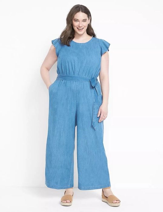 Model wearing a blue jumpsuit
