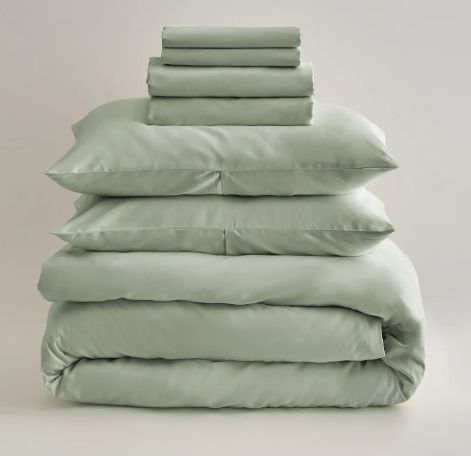 A pile of Quince bedding neatly stacked.