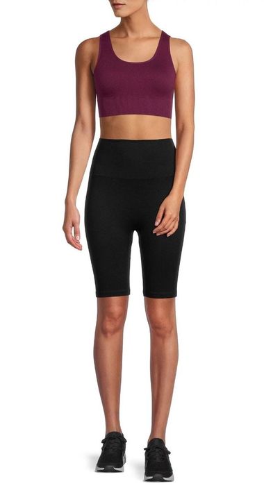 Model showcasing black biker shorts.