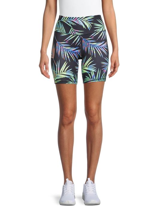 A model showcasing tropical print biker shorts