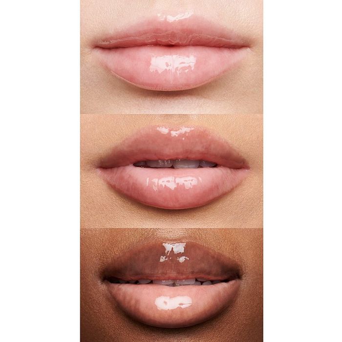 The lip gloss displayed on the lips of three distinct models