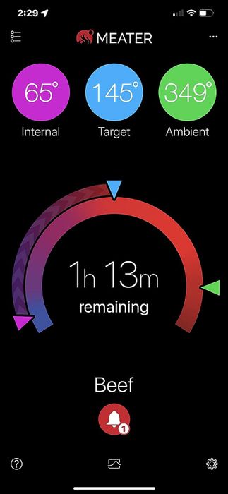 A screenshot of the Meater app displaying the remaining cooking time and current meat temperature.