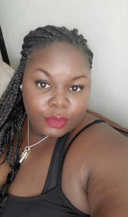 reviewer showcasing a lipstick application
