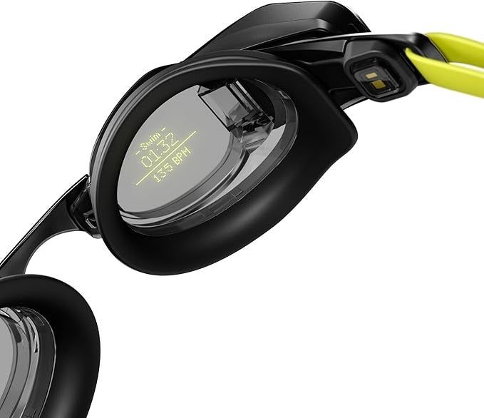 Smart swim goggles with a digital display showing swim stats like time and bpm, ideal for fitness enthusiasts