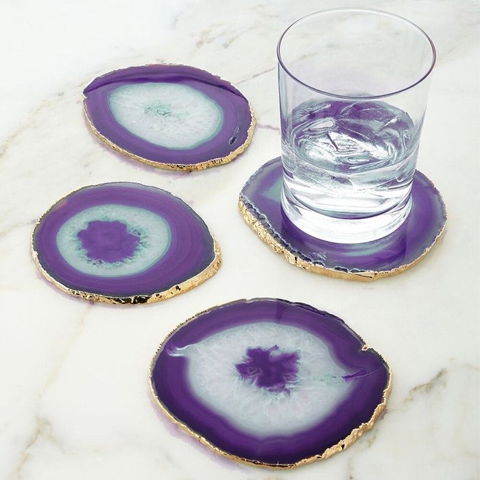 the agate coasters adorned with gold trim