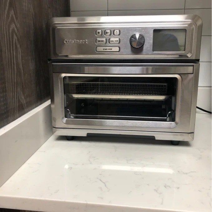 The air fryer toaster oven placed on a countertop