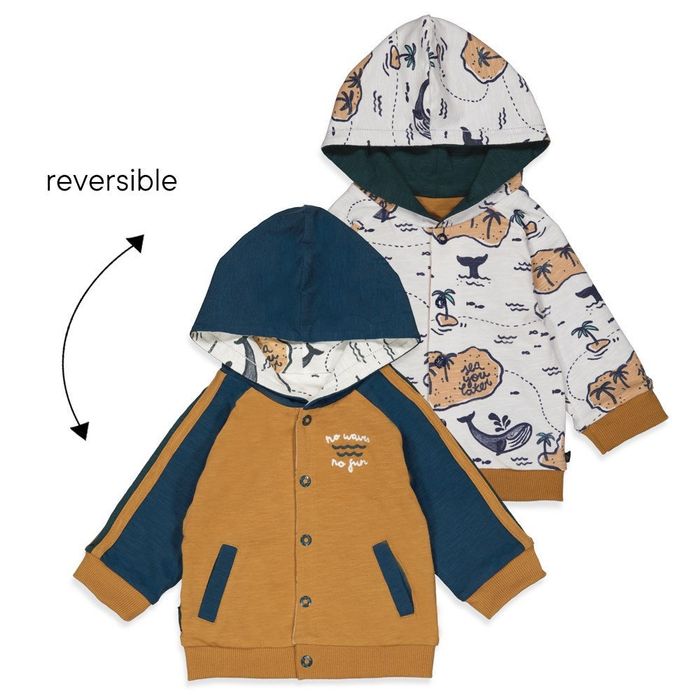 the jacket transformed, showcasing a lively beach scene print on the reverse side