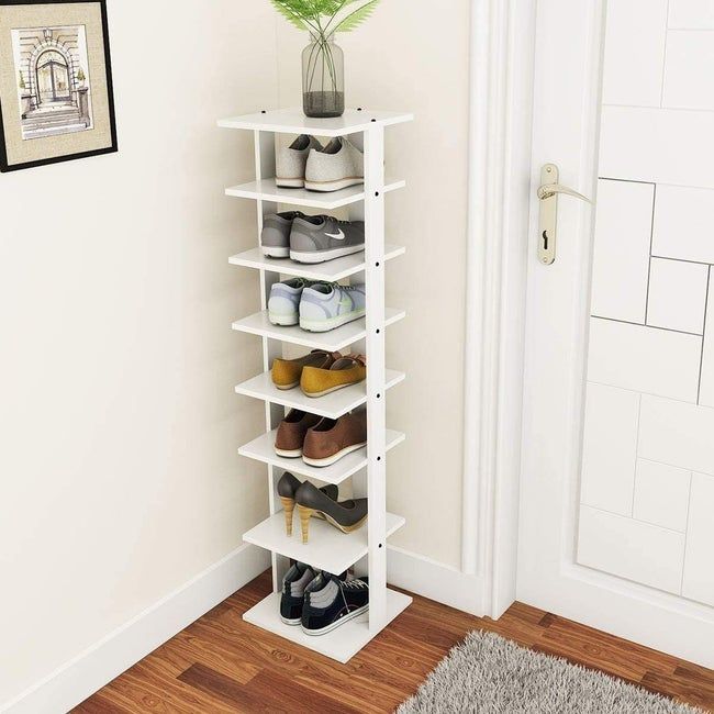 A minimalist seven-tier white shoe rack standing elegantly