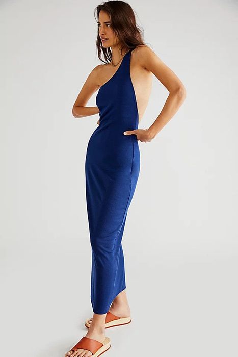 A model wearing the estate blue dress