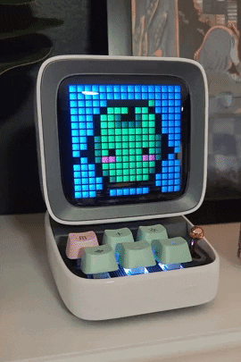 a GIF showing a Junimo from Stardew Valley dancing on the Bluetooth speaker's screen