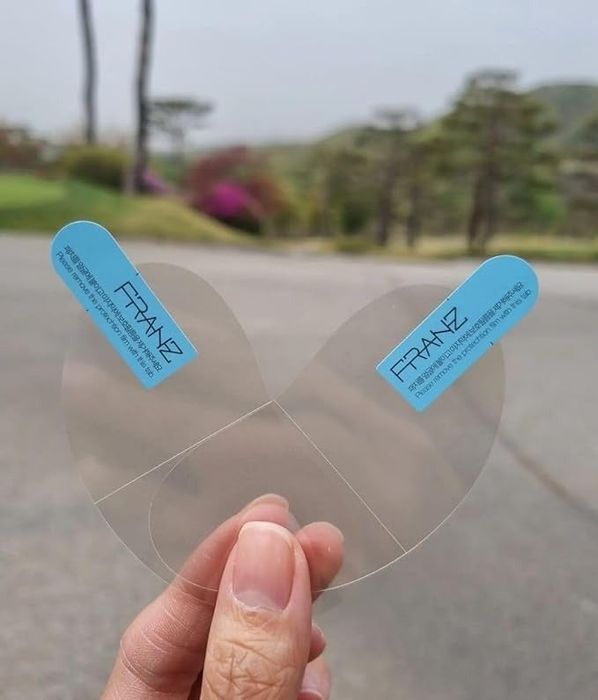 A reviewer holding the peptide patches