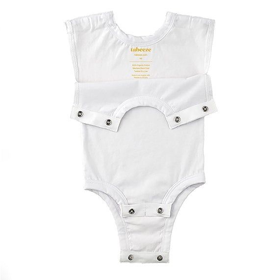 A white onesie featuring snaps at the top, allowing for easy dressing.