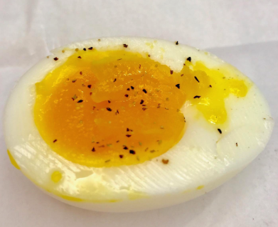 a reviewer's photo of a soft-boiled egg