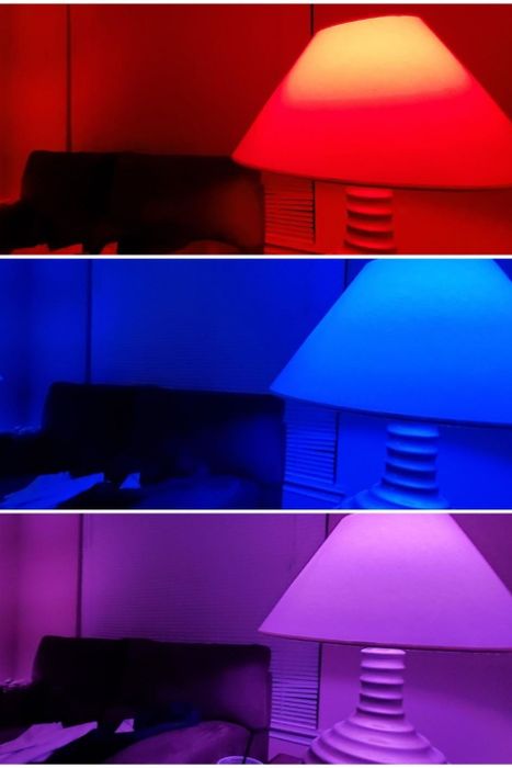 A reviewer's photo featuring three panels of the same room illuminated in red, blue, and purple hues