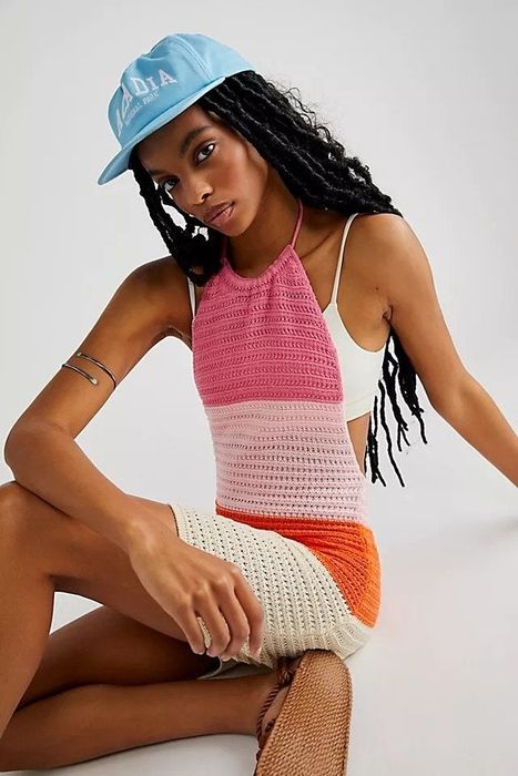 A model wearing the mini dress