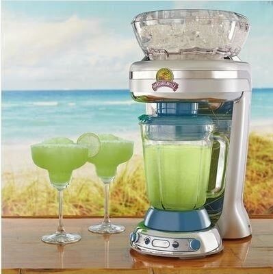 The frozen drink maker preparing margaritas