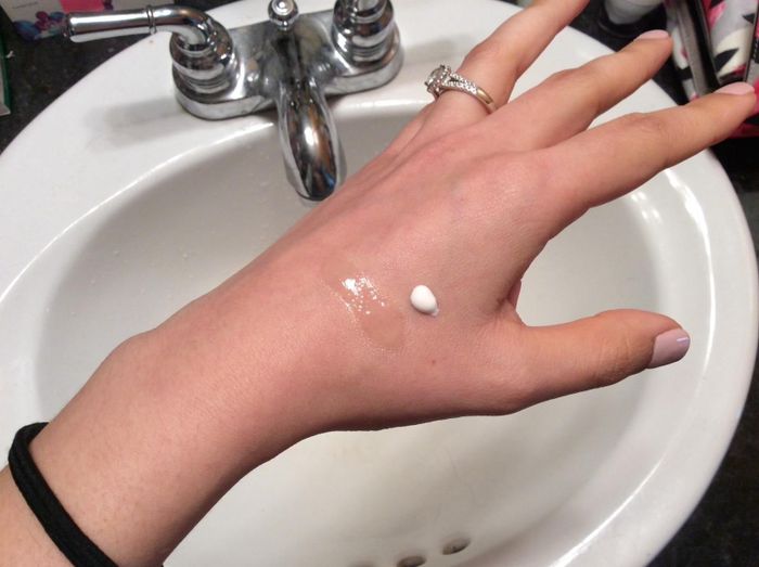 Reviewer's photo of the SPF applied on their hand