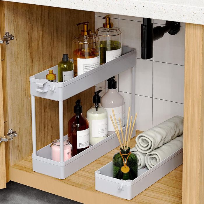Another photo demonstrating how the tiers can be detached and conveniently stored under the bathroom sink