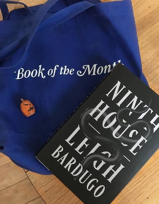 Mytour editor's Book of the Month tote bag paired with the book