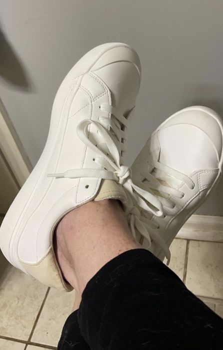 A pair of shoes in white.