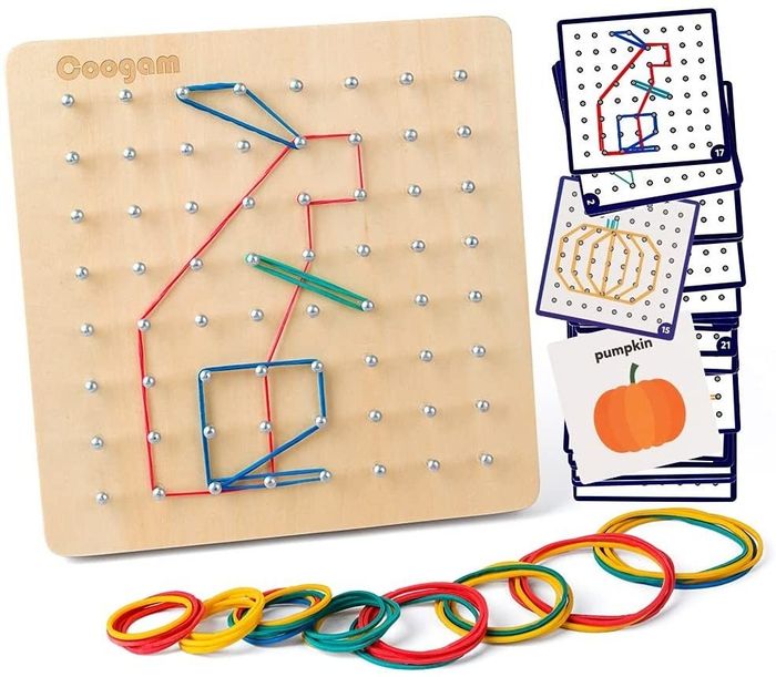 A wooden board with pegs forming a rabbit design, accompanied by pattern cards and colorful rubber bands.