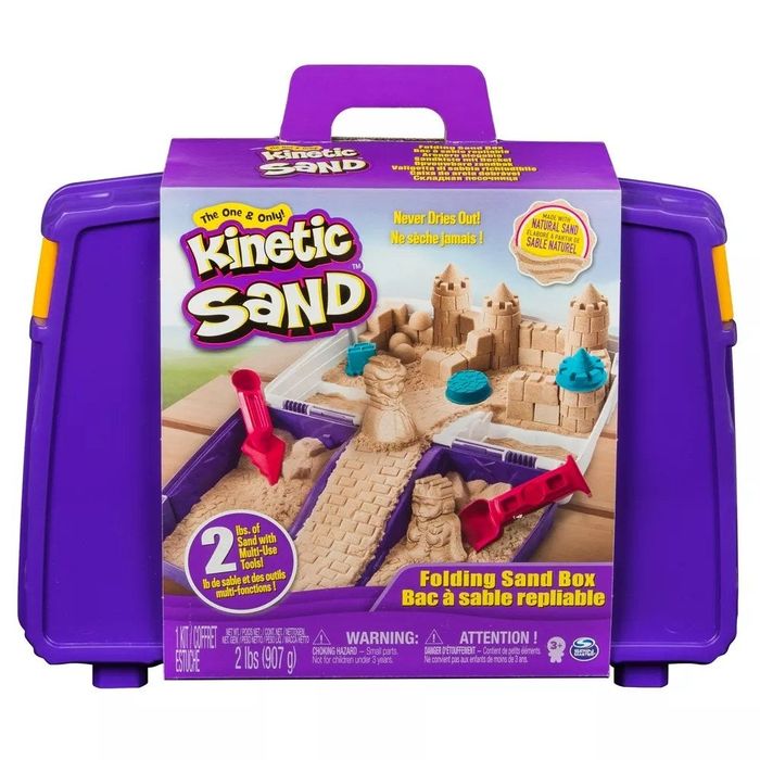 The purple sandbox toy neatly closed up with packaging showing the contents inside