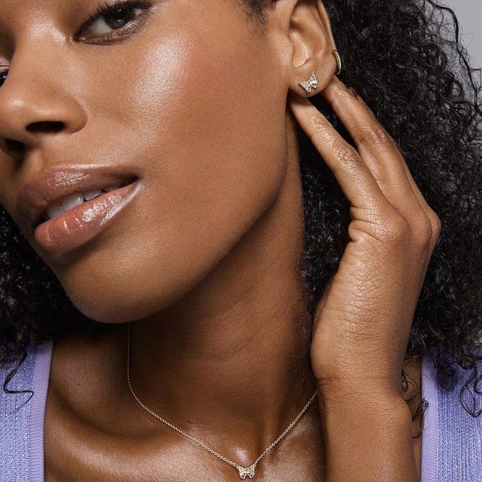 A model wearing earrings.