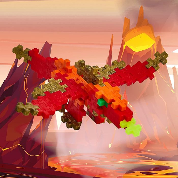 Plus Plus toy modeled as a red dragon