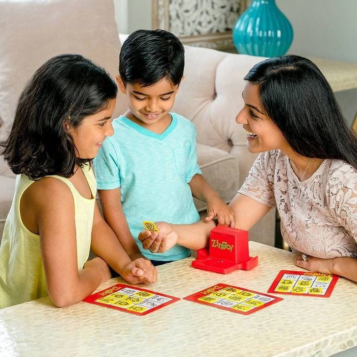 Family having a great time playing Zingo!