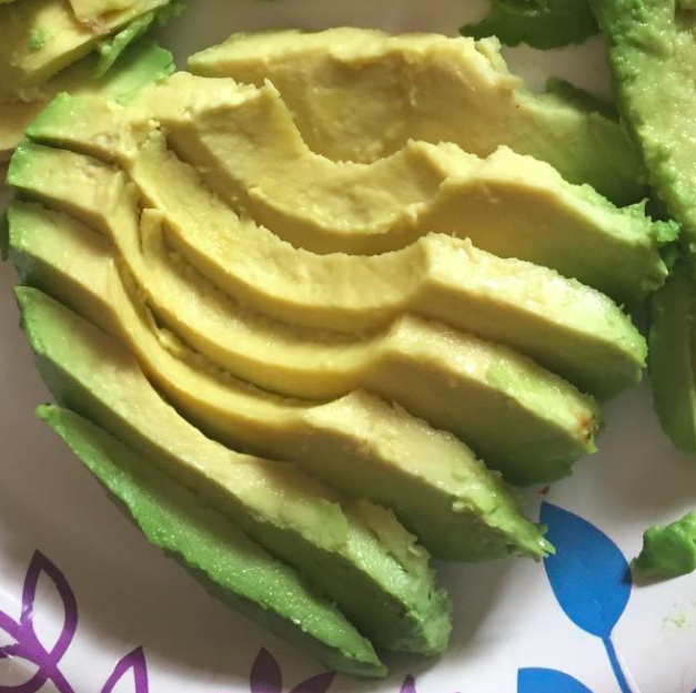 A photo from the reviewer showcasing their neatly sliced avocado arranged on a plate.
