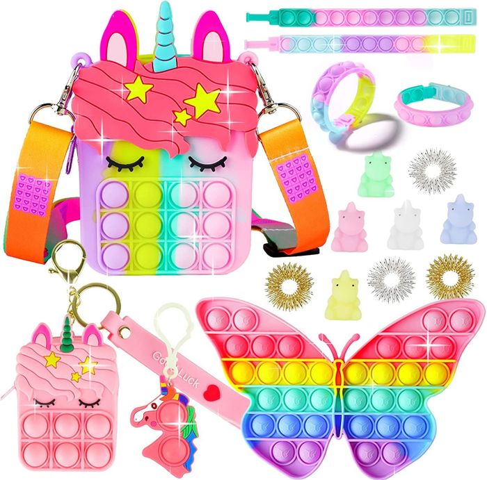 Complete set of rainbow-colored unicorn pop toys, including a purse, butterfly, and other fun accessories