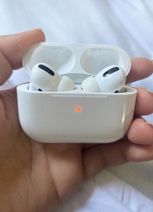 AirPods Pro stored in their charging case