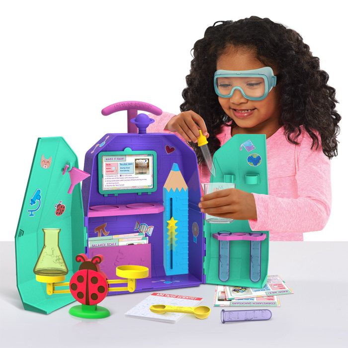 A child is seen conducting an exciting experiment using the rolling lab case, fully immersed in their scientific discovery.