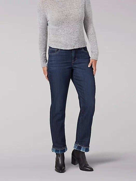 A model showcasing the fleece-lined jeans