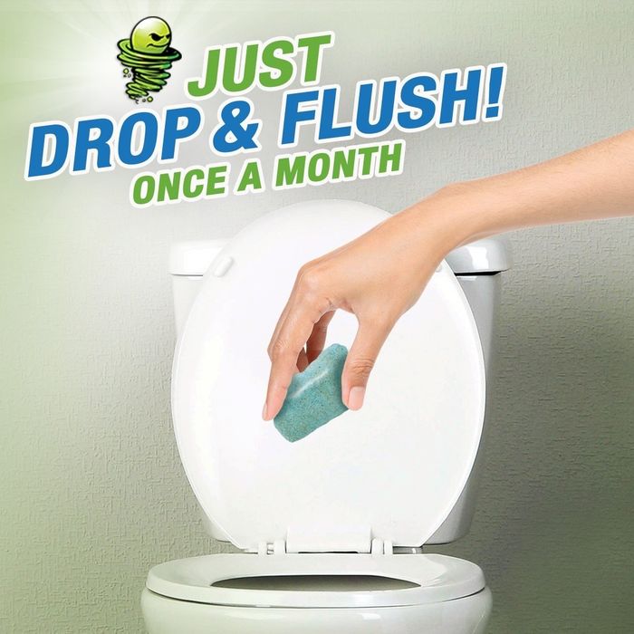 individual drops green pac into toilet