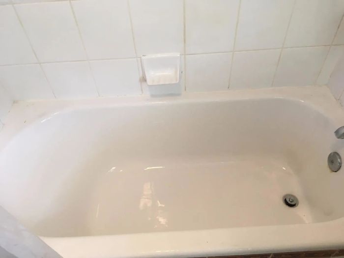 The same tub now appearing spotless and white