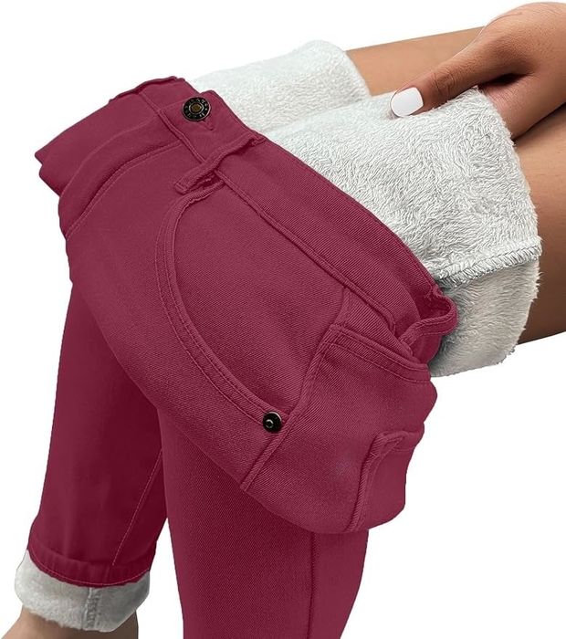 A model reveals the soft fleece lining inside the pants.