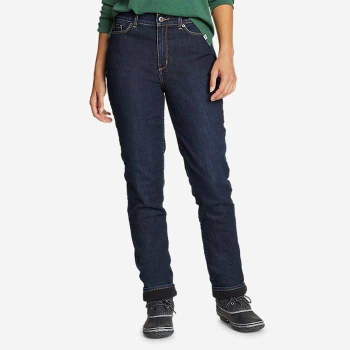 The lower portion of a model wearing straight fleece-lined jeans