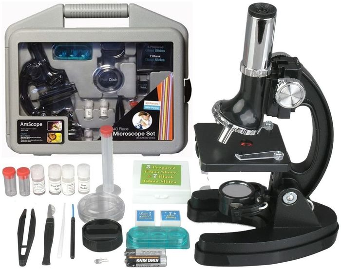 The microscope set, complete with a carrying case and all the essential accessories.
