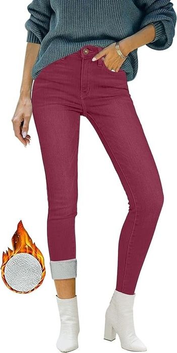 A model is showcasing the cranberry juice-colored jeans.